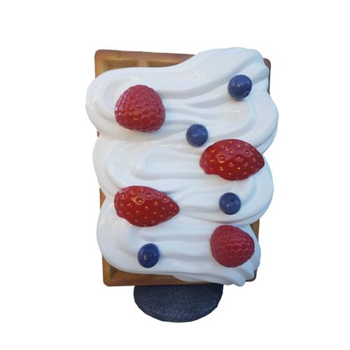 Decorative gastronomy sculpture designed as waffle with a cream, blueberry & blackberry figure 120cm height