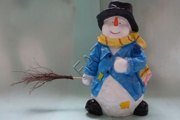 Deco figure of a christmas snowman dressed in blue jacket & holding a broom 75x50x40cm