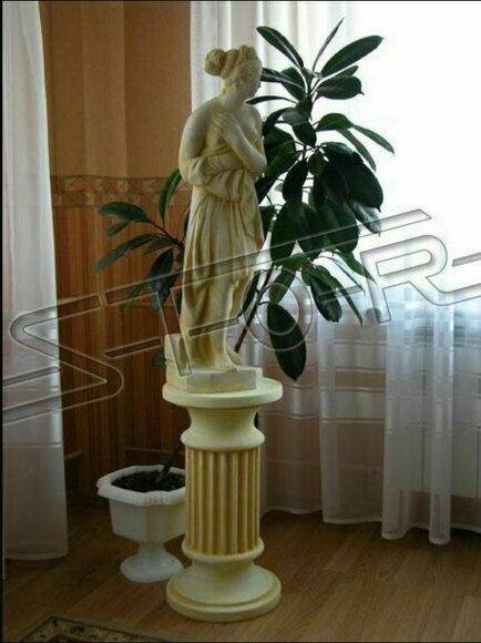 Decorative sculpture of woman on column in antique greek style, model - 604