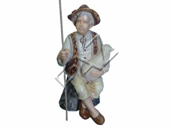 Decorative sculpture designed as sitting on a stone shepherd with a lamb 73cm