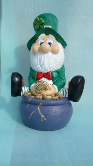 Decorative sculpture designed as a dwarf sitting on a vase full of coins 80cm