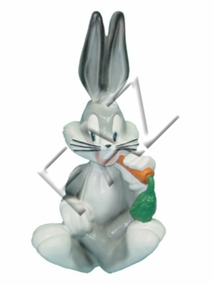 Decorative sculpture designed as gloss grey colored cartoon rabbit eating carrot