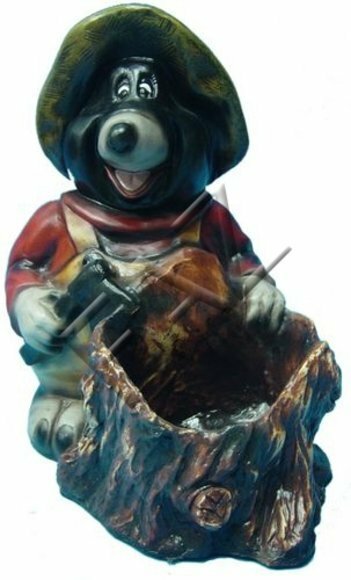 Decorative sculpture designed as black happy mole with an axe & stump 40cm height