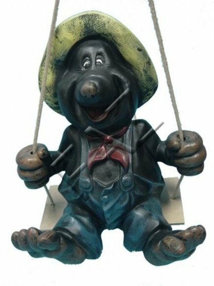 Decorative sculpture designed as black happy mole on a swing 45x36cm