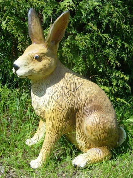 Garden decorative sculpture designed as beige motley rabbit c483a