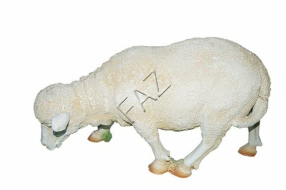 Decorative sculpture designed as white colored eating shaggy sheep 29x48x17cm