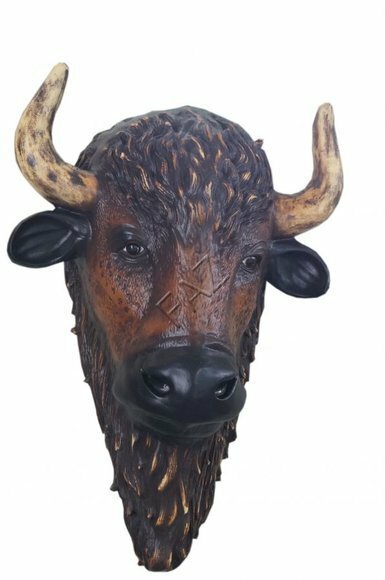 Decorative wall sculpture designed as an original motley brown colored buffalo head