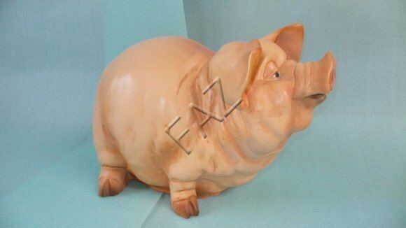 Decorative sculpture designed as light pink colored fat round pig 37x56x34 cm c548