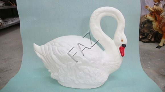 Decorative garden sculpture designed as an original white colored swan 52x65cm