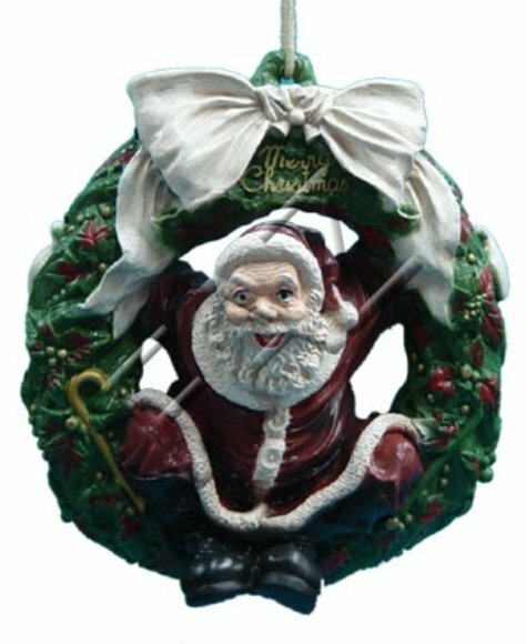 Santa claus sitting on a christmas wreath decorative figure 55x49cm