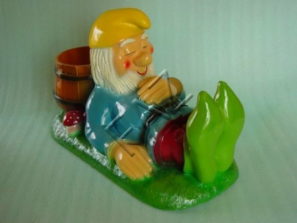 Decor garden figure designed as a sleeping dwarf on a wooden bucket 46cm