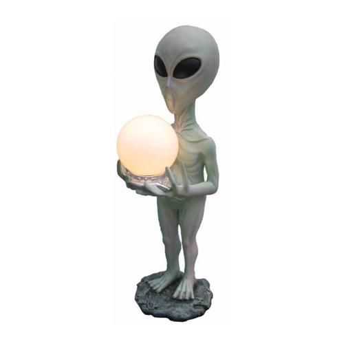 Decorative lamp designed as grey colored alien with a lamp figure