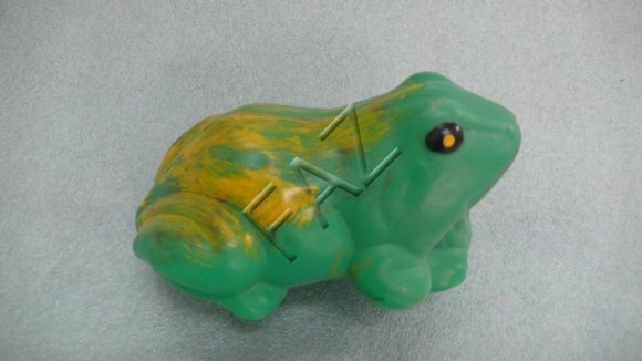 Green matte motley frog cub with yellow patterns decorative garden figure 8x13cm