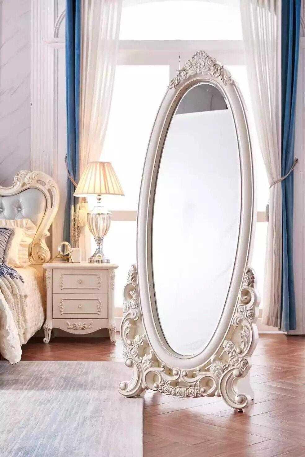 Floor mirror in the living room wood classic white a new luxury in the interior on Stock