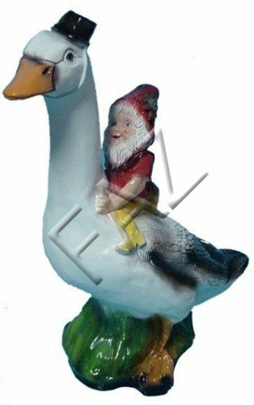 Decor garden figure designed as a massive white duck with a little dwarf 58cm