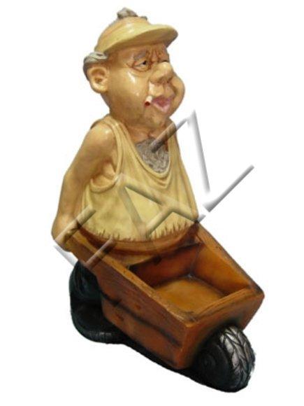 Decor figure of an adult dressed in beige cloth with a cigarette carrying a wheelbarrow 80cm