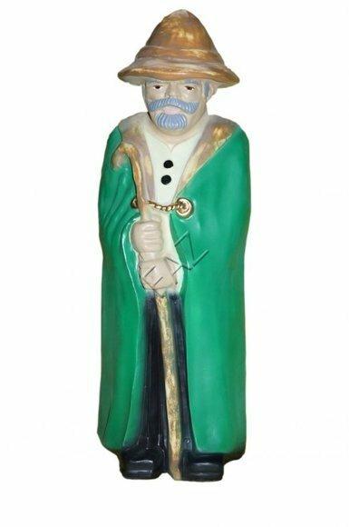 Shepherd decorative sculpture in a green raincoat with a cane 70x24cm