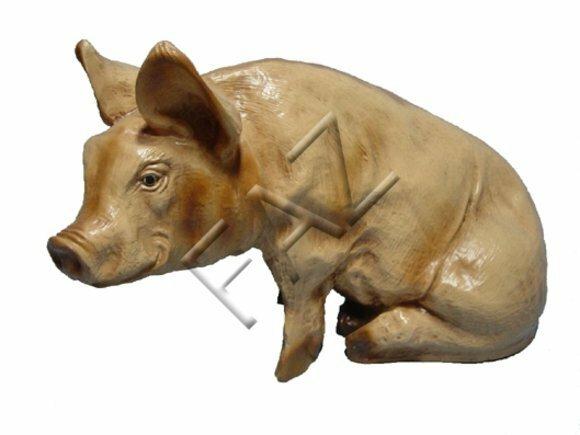 Decorative sculpture designed as light pink colored gloss sitting pig 37x54cm c32