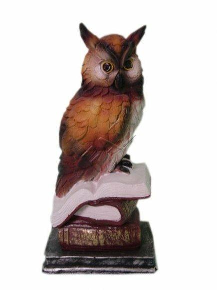 Decorative sculpture designed as an original colored motley owl 25cm height