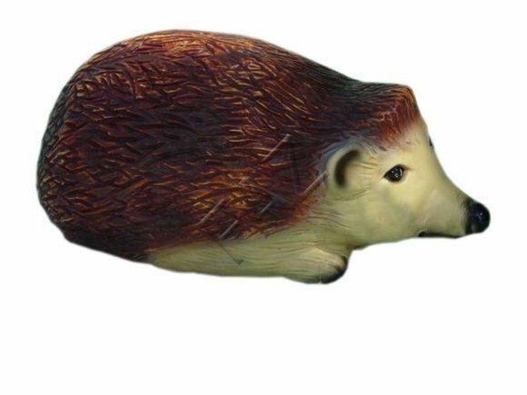 Decorative sculpture designed as an original brown beige colored motley hedgehog 20x40cm