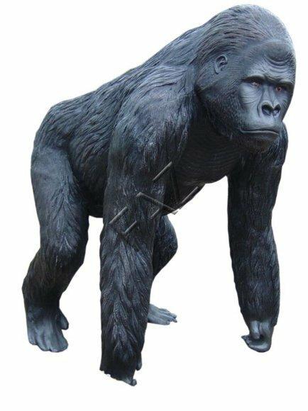 Full black colored decorative sculpture designed as an original gorilla figure