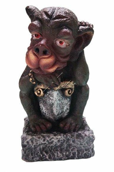 Decorative sculpture designed as a little demon dog on a stone 40x23x23cm