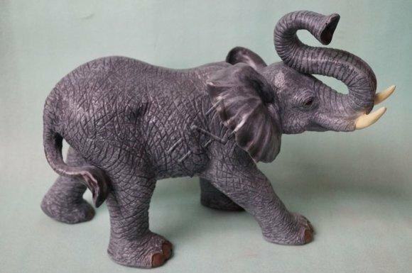 Full dark grey colored garden decorative sculpture designed as an elephant 36x65cm