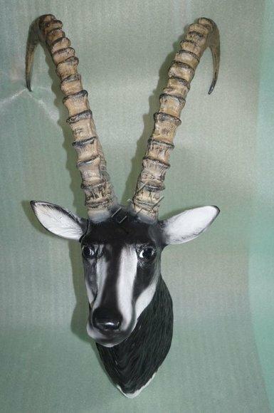 Decorative wall sculpture designed as an original colored motley black goat head with long horns 110x70x60cm