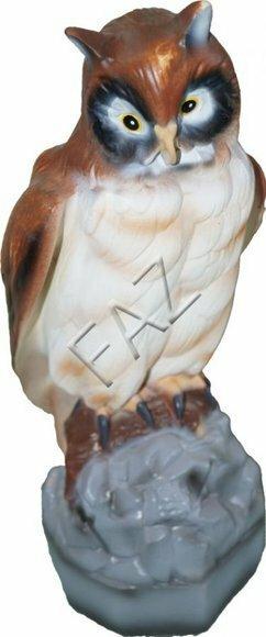 Decorative sculpture designed as an original colored brown white colored sad owl 40cm height