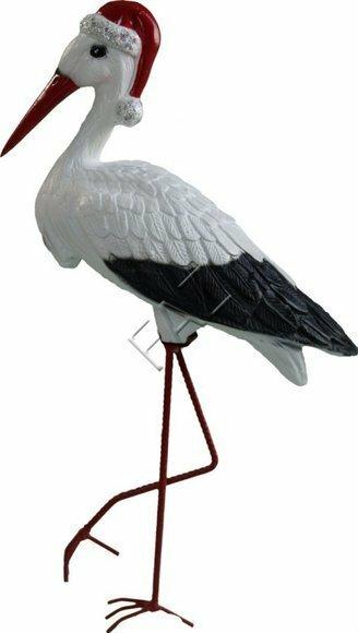 Decorative sculpture designed as an original colored stork with a christmas hat 50x30cm