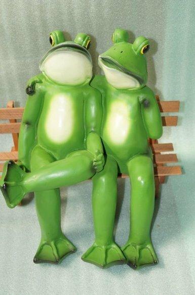 Two green matte frogs resting on a bench decorative sculpture 60x50cm c683