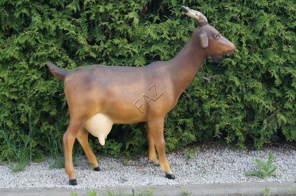 Decorative garden sculpture designed as motley brown colored standing goat 110x122x32cm