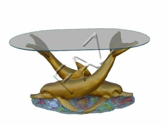 Oval glass coffee table with decorative two golden colored dolphins 47cm