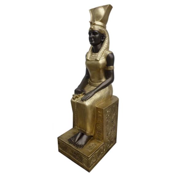 Ancient egyptian golden colored decorative sculpture designed as goddess on a throne 125cm