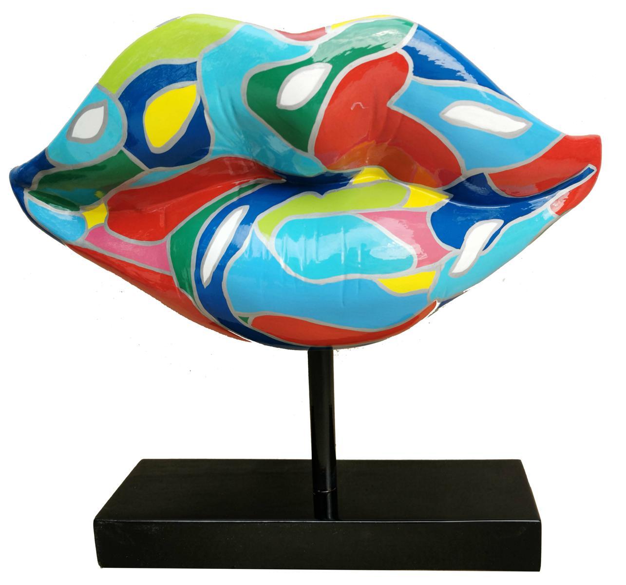 Decorative abstract figure designed as a lips in colorful patterns on a black stand 45cm