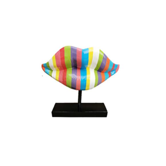 Abstract decorative sculpture designed as a lips in colorful stripes on a black stand 47cm