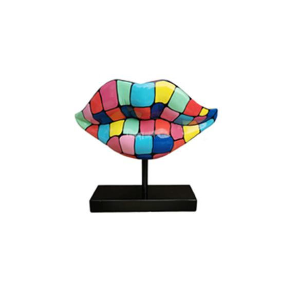 Abstract decorative sculpture designed as a lips in colorful square patterns on a black stand 47cm