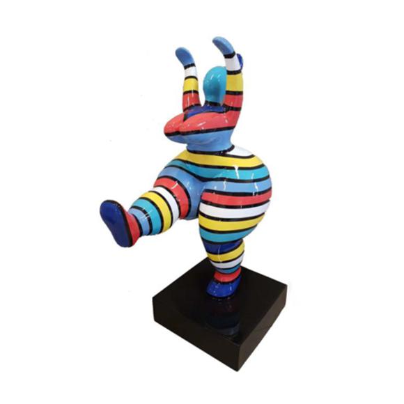 Abstract decorative sculpture designed as a gloss gymnastic figure on a black stand in colorful patterns 50cm