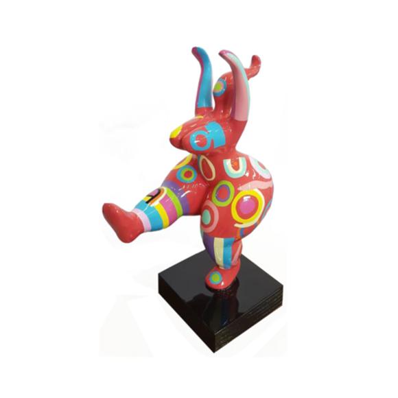 Pink gloss colored abstract decorative sculpture of a gymnastic figure in colorful patterns 50cm