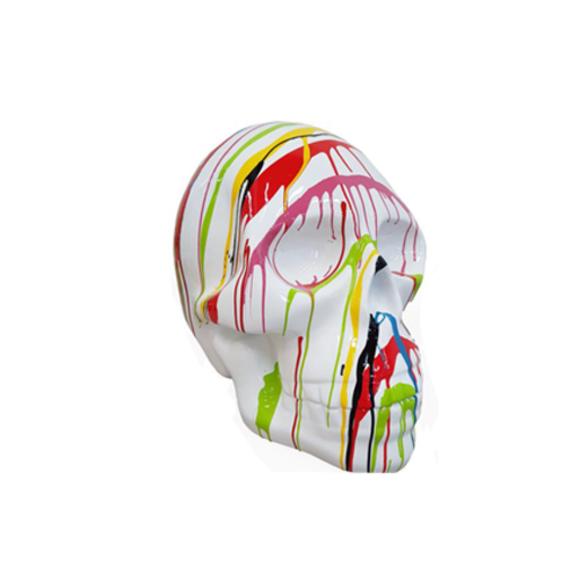 Abstract white colored decorative sculpture designed as a skull in colorful stripes 66cm