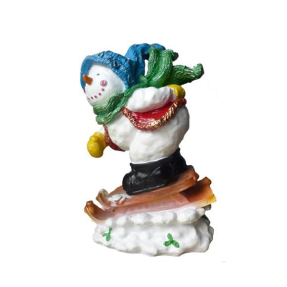 Decorative white colored snowman on a sled figure 40cm