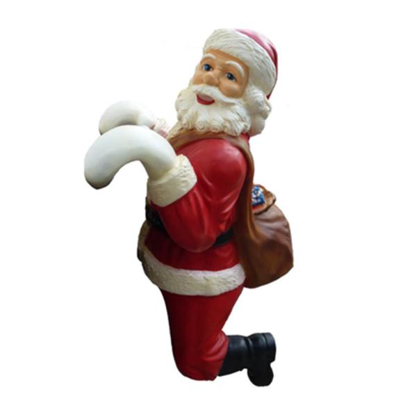 Christmas decorative sculpture designed as a jumping santa claus 108cm