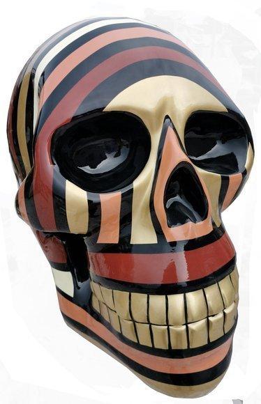 Abstract decorative sculpture designed as a gloss colored in dark red black tones skull figure 58cm